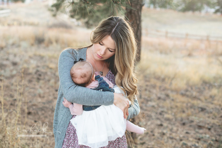Best family photographer in the Colorado areas of Denver, Aurora, Parker, Stapleton, Southlands, Centennial, Cherry Creek, Littleton, Highlands Ranch, Morrison, Brighton, Lone Tree and Castle Rock taking photos of children, sisters, brothers, moms, dads, toddlers in trees and woods.