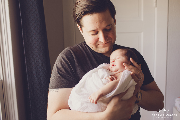 Denver newborn shot in the family home with mom and dad after birth by lifestyle photographer