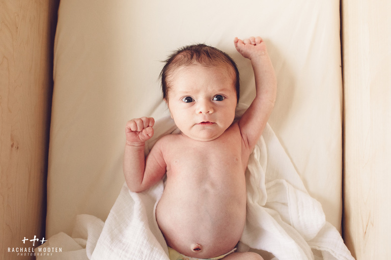 Denver newborn shot in the family home with mom and dad after birth by lifestyle photographer